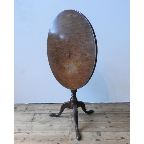 78 - A VICTORIAN MAHOGANY TILT-TOP TRIPOD TABLE, with a solid one piece top, 72 cm high, 72 cm dia