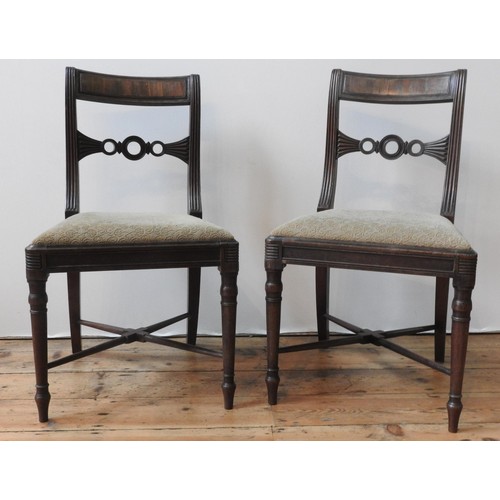 80 - A SET OF FOUR VICTORIAN MAHOGANY DINING CHAIRS, with turned legs supported by cross stretchers, the ... 