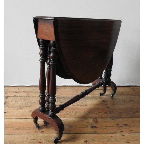 82 - A VICTORIAN MAHOGANY SUTHERLAND TABLE, the folding circular top supported on turned legs and stretch... 