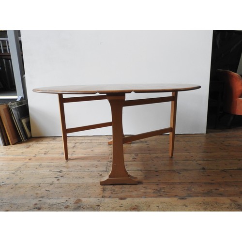 86 - AN ERCOL LIGHT WOOD DROP-LEAF TABLE AND FOUR ERCOL HIGH BACK SPINDLE CHAIRS, the chairs measuring 97... 