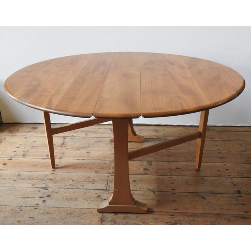 86 - AN ERCOL LIGHT WOOD DROP-LEAF TABLE AND FOUR ERCOL HIGH BACK SPINDLE CHAIRS, the chairs measuring 97... 