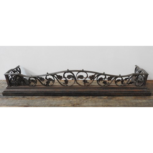 106 - A CAST-IRON ORNATE FOLIATE PATTERN FIRE CURB