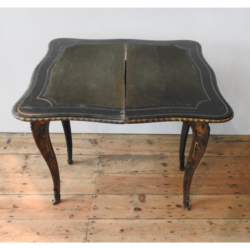 460 - AN ORNATE 19TH CENTURY FRENCH BOULE WORK FOLDING CARD TABLE, with baize lined top, folding swivel me... 