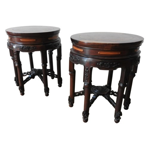 273A - GOOD PAIR OF HONGMU AND BURRWOOD STOOLSLATE QING DYNASTYwith 'floating' panel circular tops, above a... 