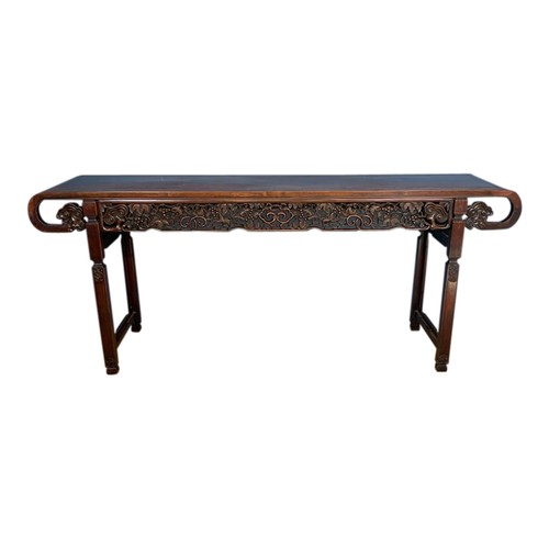 271A - CARVED HONGMU ALTAR TABLEQING DYNASTY, 19TH CENTURYthe rectangular top above an ornate open work fri... 