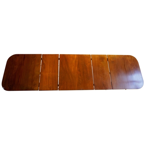 3 - MAHOGANY TRIPLE PILLAR DINING TABLE, BY JONATHAN SAINSBURYwith two leaf insertions, the d-shaped top... 