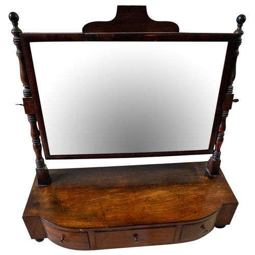 228 - REGENCY MAHOGANY TOILET MIRRORCIRCA 1820the rectangular adjustable mirror raised on twin turned upri... 