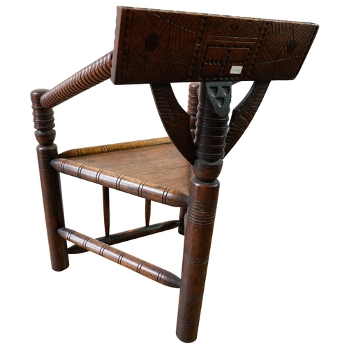 12 - OAK TURNERS CHAIR19TH CENTURYthe trepizochial back with bobbin turned arms, supported by a turned un... 