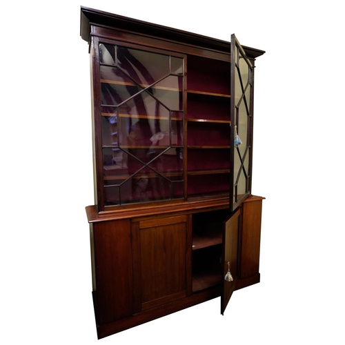 16 - MAHOGANY LIBRARY BOOKCASE19TH CENTURYtop and base associated, the moulded cornice above two astragal... 