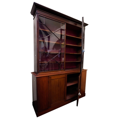 16 - MAHOGANY LIBRARY BOOKCASE19TH CENTURYtop and base associated, the moulded cornice above two astragal... 