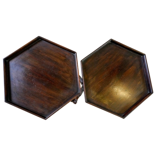 22 - PAIR OF GEORGE III STYLE MAHOGANY TORCHERESEARLY 20TH CENTURYthe hexagonal tray tops raised on leaf ... 