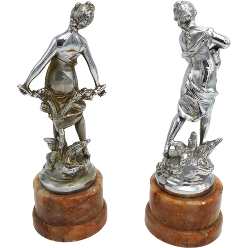 459 - PAIR OF SILVERED BRONZE FIGURESEARLY 20TH CENTURYeach modelled as a classical maiden, raised on onyx... 