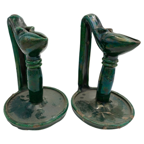 362 - PAIR OF SHIWAN WARE GREEN-GLAZED OIL LAMPSTURKEY, 19TH CENTURYwith long angular handles and circular... 