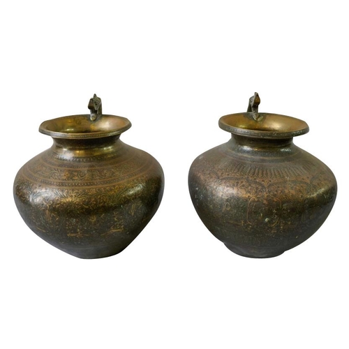 368 - TWO LARGE PERSIAN ENGRAVED BRASS JARS19TH CENTURYeach with serpent handle, the baluster sides engrav... 