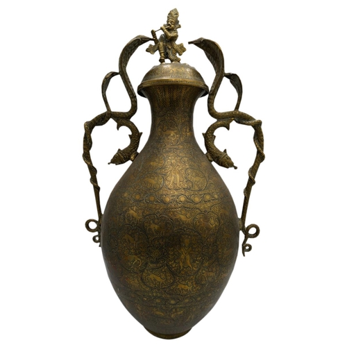 369 - LARGE INDIAN BRASS COVERED VASE19TH CENTURYwith twin serpent and snake cast handles, the cover surmo... 