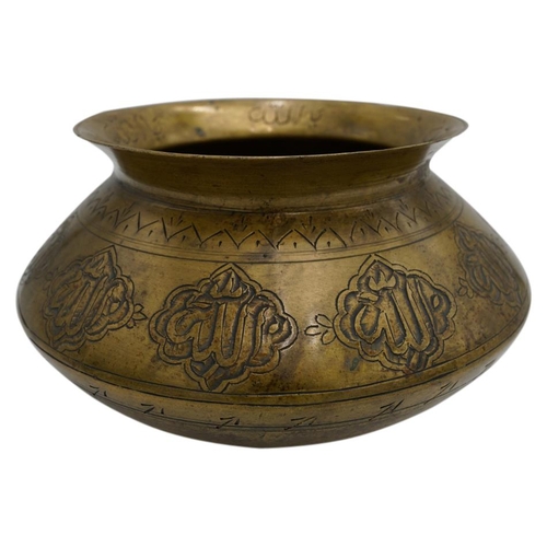 374 - ISLAMIC BRASS BOWL19TH CENTURYthe compressed baluster sides engraved with Islamic script23cm diamPRO... 