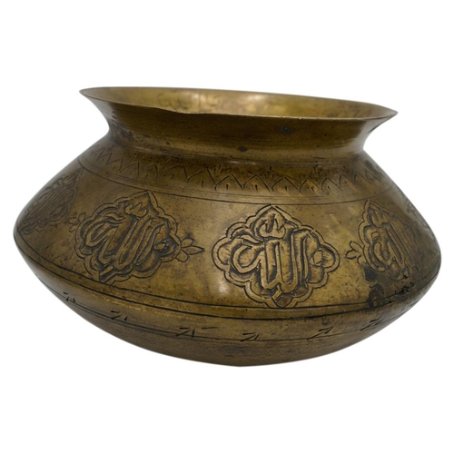 374 - ISLAMIC BRASS BOWL19TH CENTURYthe compressed baluster sides engraved with Islamic script23cm diamPRO... 