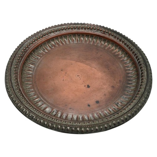 381 - GROUP OF PERSIAN TINNED COPPER WARES19TH CENTURYcomprising a large tray, three circular dishes, two ... 