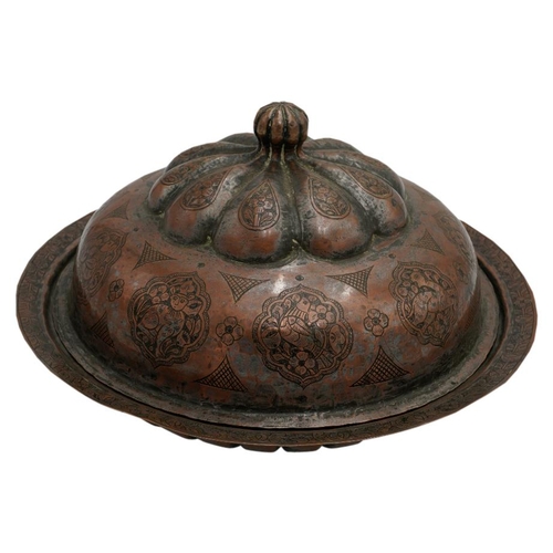 390 - PERSIAN TINNED COPPER COVERED DISH19TH CENTURY the domed cover engraved with a band of arabesques en... 