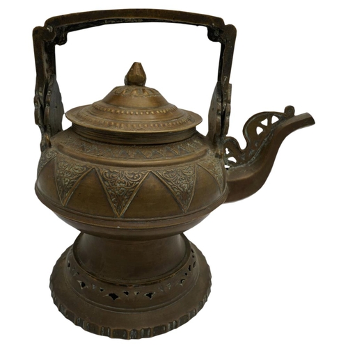 394 - THREE SOUTH EAST ASIAN BRASS WATER KETTLES19TH CENTURYlargest, 27cm high, smallest, 22cm highPROVENA... 