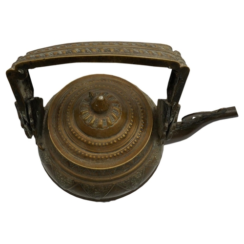 394 - THREE SOUTH EAST ASIAN BRASS WATER KETTLES19TH CENTURYlargest, 27cm high, smallest, 22cm highPROVENA... 