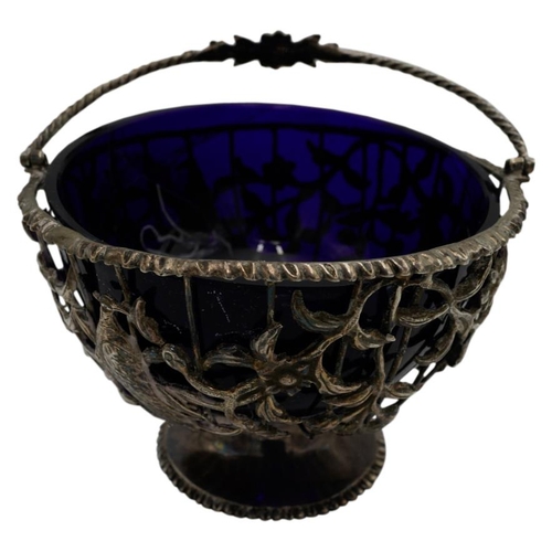 463 - GEORGE III SILVER SUGAR BASKETLONDON 1769the openwork sides with a blue glass liner and with applied... 