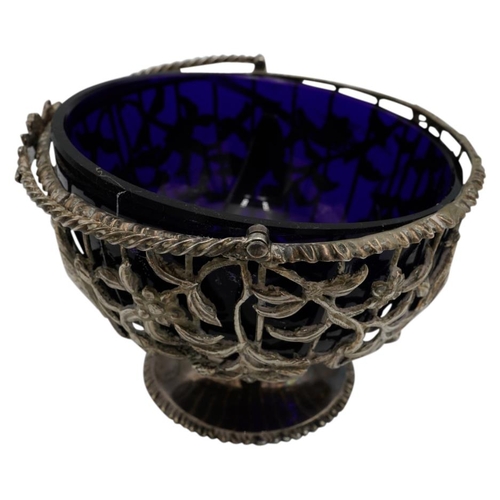 463 - GEORGE III SILVER SUGAR BASKETLONDON 1769the openwork sides with a blue glass liner and with applied... 