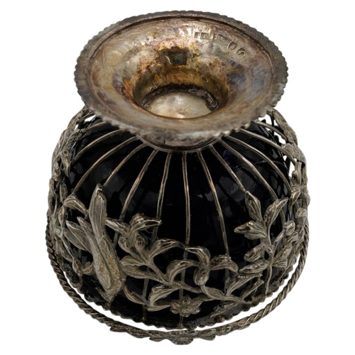 463 - GEORGE III SILVER SUGAR BASKETLONDON 1769the openwork sides with a blue glass liner and with applied... 