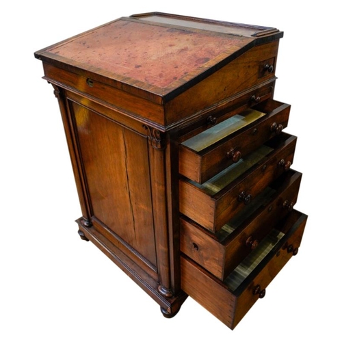 33 - GOOD WILLIAM IV ROSEWOOD DAVENPORT IN THE MANNER OF GILLOWSCIRCA 1835the sliding sloped top with an ... 