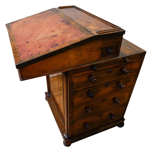 33 - GOOD WILLIAM IV ROSEWOOD DAVENPORT IN THE MANNER OF GILLOWSCIRCA 1835the sliding sloped top with an ... 