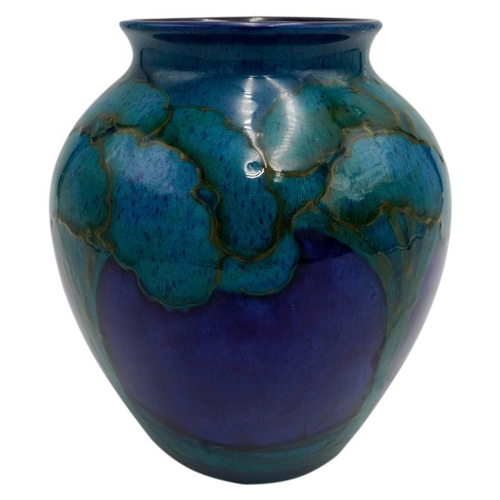 215 - WILLIAM MOORCROFT 'MOONLIT BLUE ' BALUSTER VASECIRCA1925painted with trees in a landscape, signed in... 