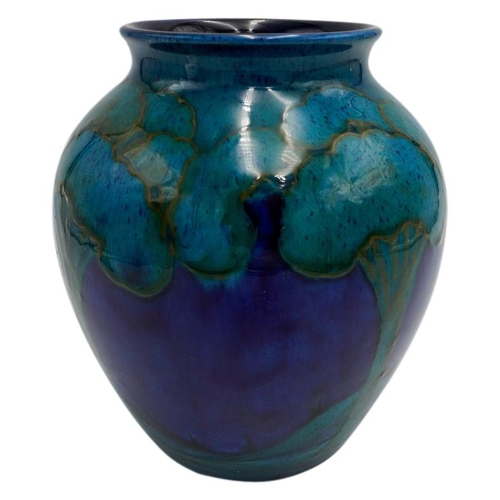 215 - WILLIAM MOORCROFT 'MOONLIT BLUE ' BALUSTER VASECIRCA1925painted with trees in a landscape, signed in... 