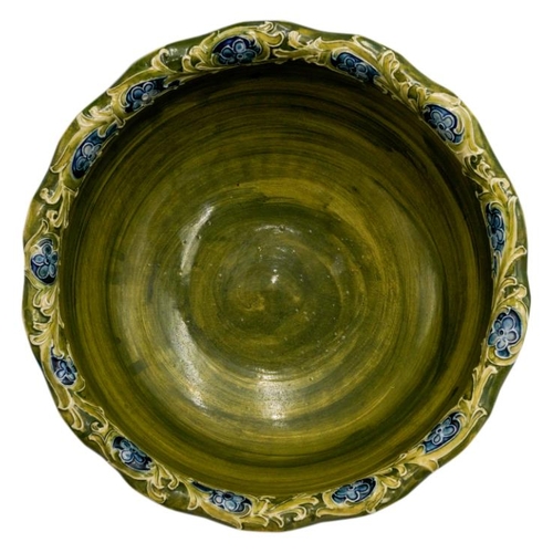 217 - LARGE WILLIAM MOORCROFT FOR MACINTYRE BOWLCIRCA 1925the sides decorated with stylised lotus, signed ... 