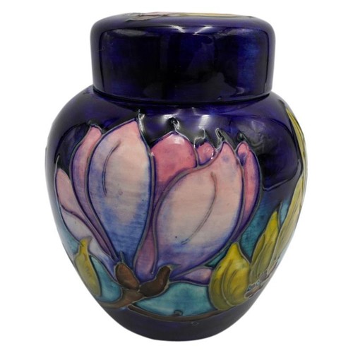 220 - MOORCROFT MAGNOLIA PATTERN COVERED JARCIRCA 1980signed and with impressed marks, 15cm high; together... 