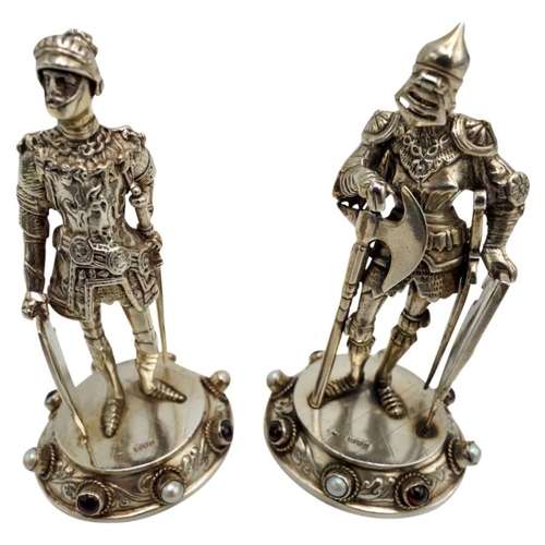 482 - PAIR OF SILVER FIGURES OF KNIGHTSLONDON 1975each modelled standing in full armour, raised on cabocho... 