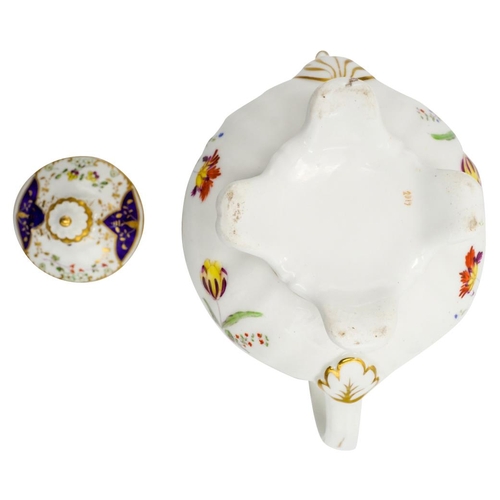 182 - THREE VICTORIAN PORCELAIN TEAPOTS19TH CENTURYeach painted with brightly coloured floral bouquets, en... 