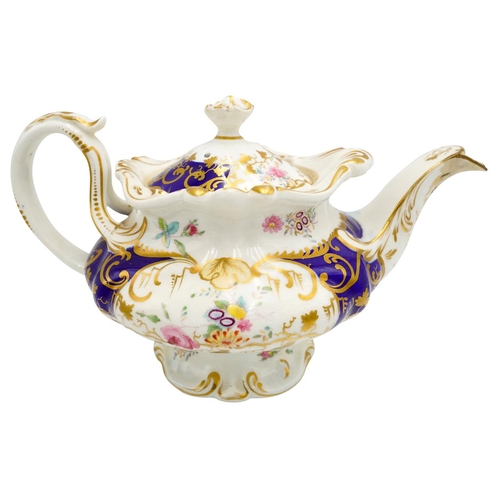 182 - THREE VICTORIAN PORCELAIN TEAPOTS19TH CENTURYeach painted with brightly coloured floral bouquets, en... 