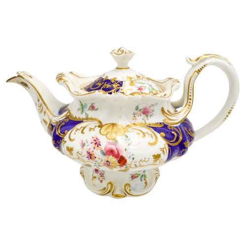 182 - THREE VICTORIAN PORCELAIN TEAPOTS19TH CENTURYeach painted with brightly coloured floral bouquets, en... 