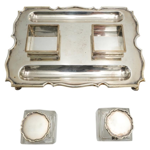 486 - EDWARDIAN SILVER INKWELLCHARLES STUART HARRIS, LONDON 1901the rectangular base surmounted by two cut... 