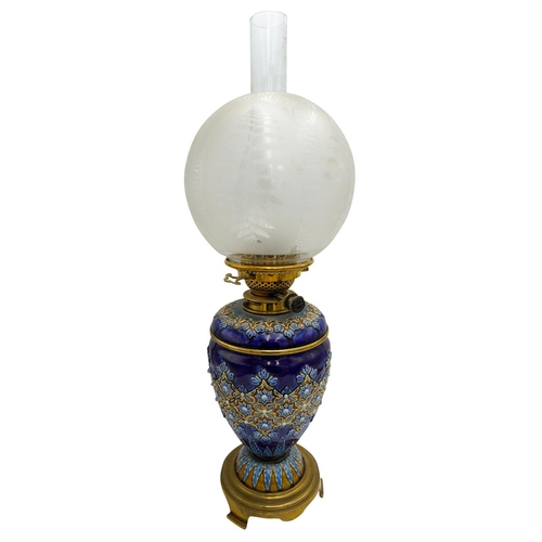 99 - DOULTON LAMBETH OIL LAMPCIRCA 1900raised on a gilt metal base63cm high (including chimney) PROVENANC... 