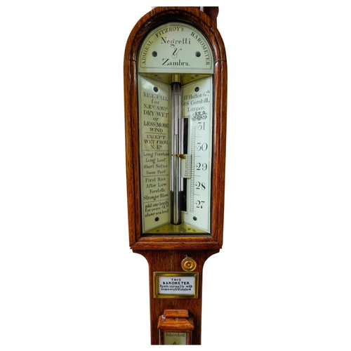 104 - VICTORIAN OAK CASED ADMIRAL FITZROY'S STORM BAROMETER BY NEGRETTI & ZAMBRA19TH CENTURYWith arche... 