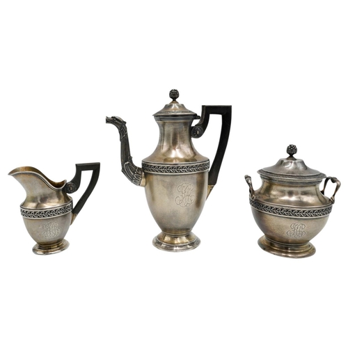 494 - FRENCH SILVER THREE PIECE COFFEE SERVICEEDMOND TETARD, 1880-1903a small coffee pot and creamer and a... 