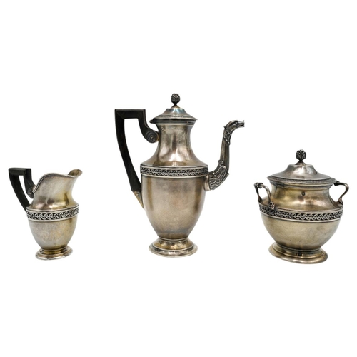 494 - FRENCH SILVER THREE PIECE COFFEE SERVICEEDMOND TETARD, 1880-1903a small coffee pot and creamer and a... 