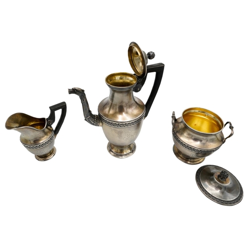 494 - FRENCH SILVER THREE PIECE COFFEE SERVICEEDMOND TETARD, 1880-1903a small coffee pot and creamer and a... 