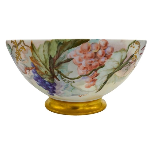 193 - LARGE LIMOGES 'COMMEMORATIVE' PUNCH BOWLEARLY 20TH CENTURYpainted with fruiting vines, inscribed 'AD... 