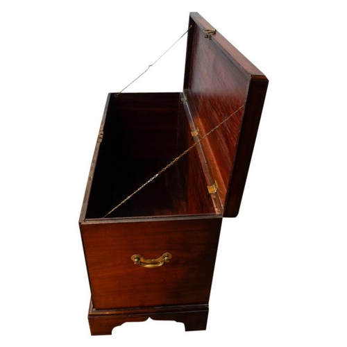 48 - GEORGE III MAHOGANY TRUNKMID 18TH CENTURYwith brass side carrying handles, the hinged top with a mou... 