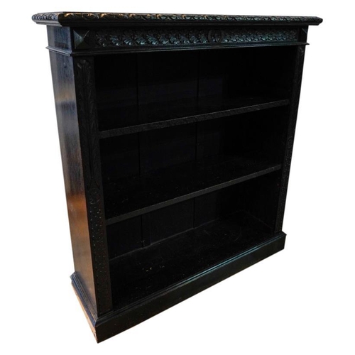 50 - VICTORIAN CARVED OAK OPEN BOOKCASELATE 19TH CENTURYwith three adjustable open shelves, raised on a p... 