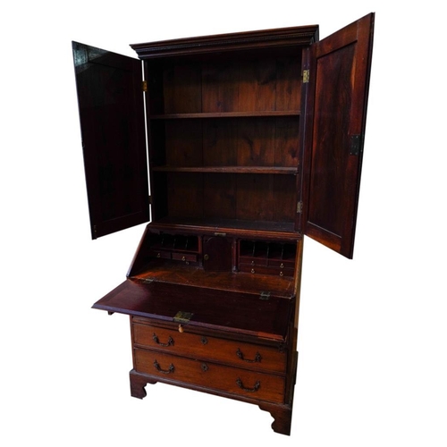 53 - SMALL GEORGE III MAHOGANY BUREAU BOOKCASECIRCA 1760the dentil cornice above a pair of panelled cupbo... 