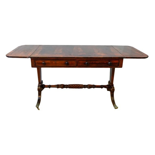 57 - GOOD REGENCY ROSEWOOD AND BRASS INLAID SOFA TABLECIRCA 1820the ebony line inlaid drop-leaf rounded r... 