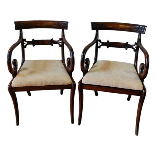 64 - PAIR OF REGENCY MAHOGANY ARMCHAIRSCIRCA 1815the bar backs with downswept scroll arms above Trafalgar... 